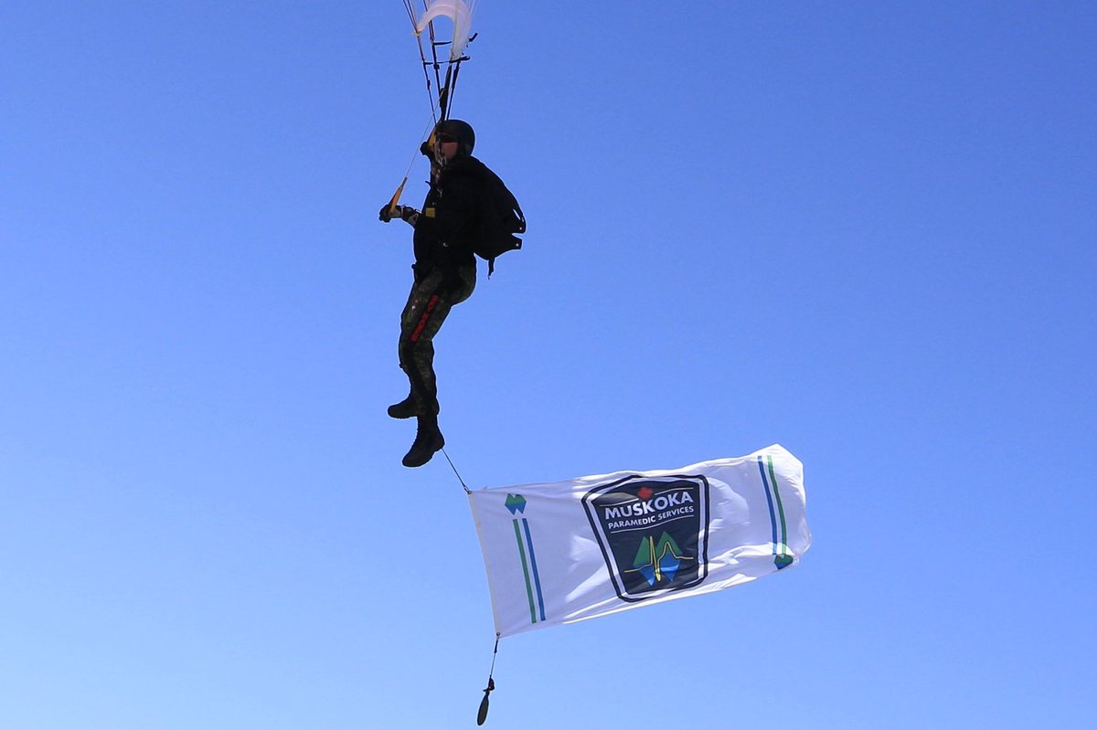 lsteiger3's tweet photo. CF parachute team “the Skyhawks” jump &amp; fly Muskoka Paramedic Services Flag for our Honour Guard! https://t.co/q5OUFOCFRw