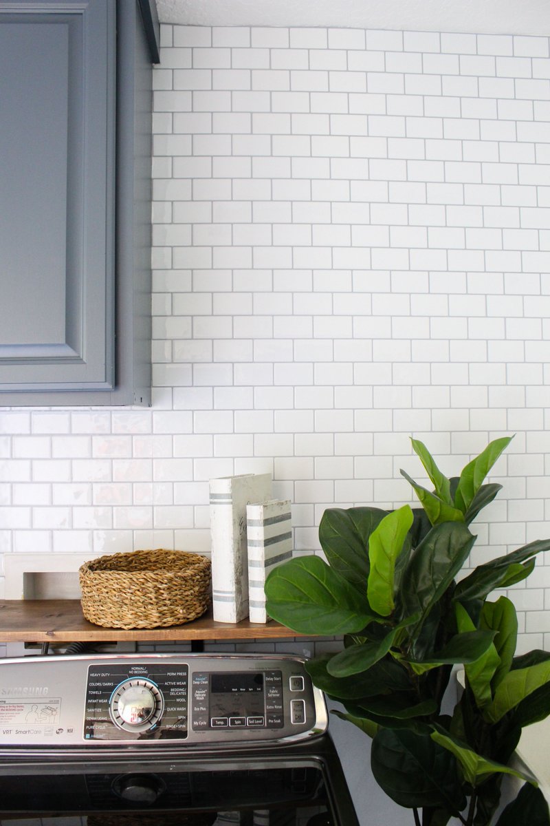 WithintheGrove's tweet photo. When Tic Tac Tiles made an appearance in our laundry room, this was the result! Talk about a makeover that took only 2 hours and zero mess left behind. See the full reveal and tutorial video on the blog! https://t.co/XQFVxR00FX https://t.co/eULexQdsBQ