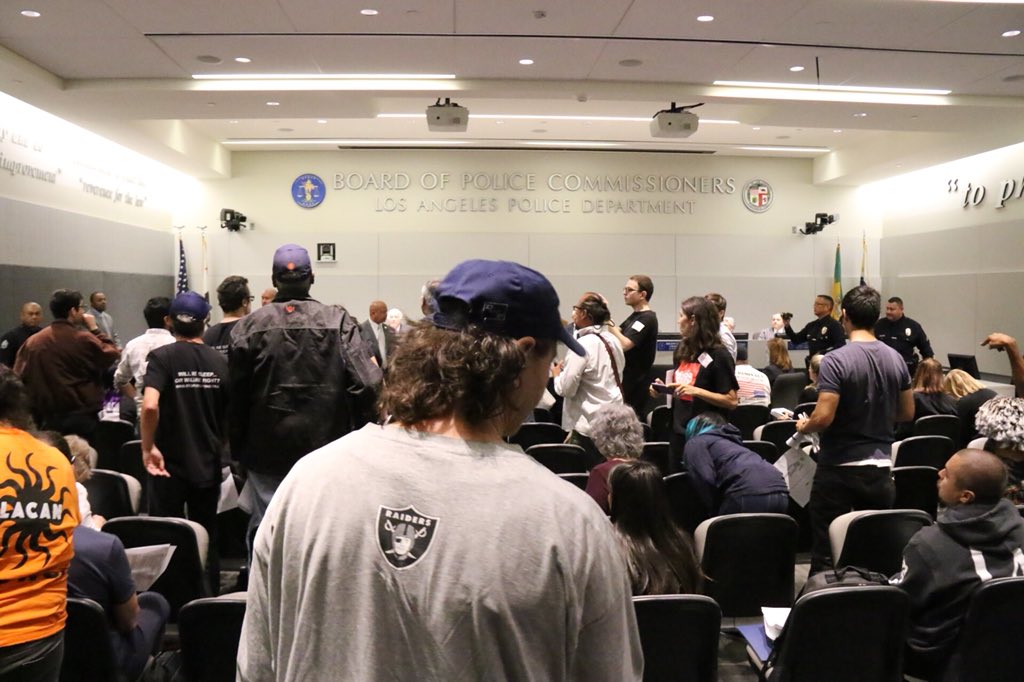 knxpete's tweet photo. #BREAKING #LAPD #ChiefBeck Protestors at Police Commission disrupt Chiefs Report. One person threw a substance, possible ashes, which hit the Chief. Woman arrested for Battery on a Police Officer. 2nd woman arrested for same charge outside room @KNX1070 https://t.co/ttSmasrapZ