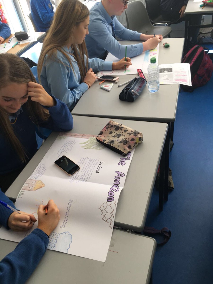 Some of our TYs working together on a poster displaying the wonders of the tropical rainforest #tropicalrainforest #pairwork #assistivetechnology #geography