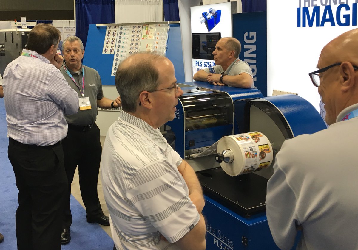 HoskinsKC's tweet photo. Attending Infoflex 2018 in Indianapolis today to learn more about the flexography printing industry. @BTA_ORG member @MuratecAmerica is here showing a product in its line of label printers. https://t.co/sBdzZFqAU1