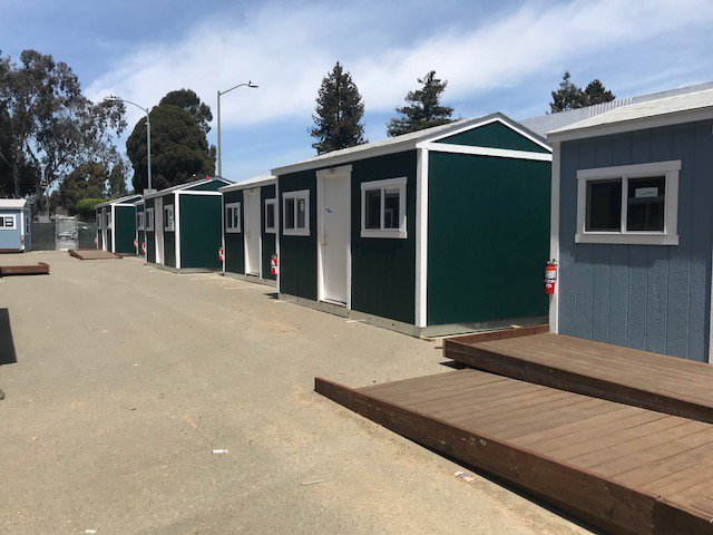 LibbySchaaf's tweet photo. Oakland will soon be opening a second "Tuff Shed Shelter" site at 27th and Northgate. This is the second temporary site we have opened in the past six months as part of an ongoing pilot project. Read &amp; Share my latest newsletter --> https://t.co/xBFIL5Ot3j https://t.co/sMPe6eOfNb