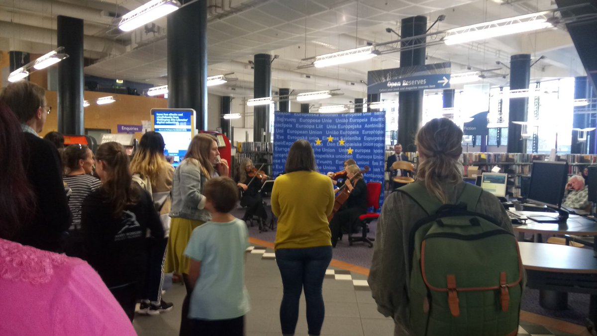 EUinNZ's tweet photo. No strings attached! @OrchestraWLG string quartet performs for #EuropeDay2018 in @wcl_library https://t.co/HUFZ8tfObU