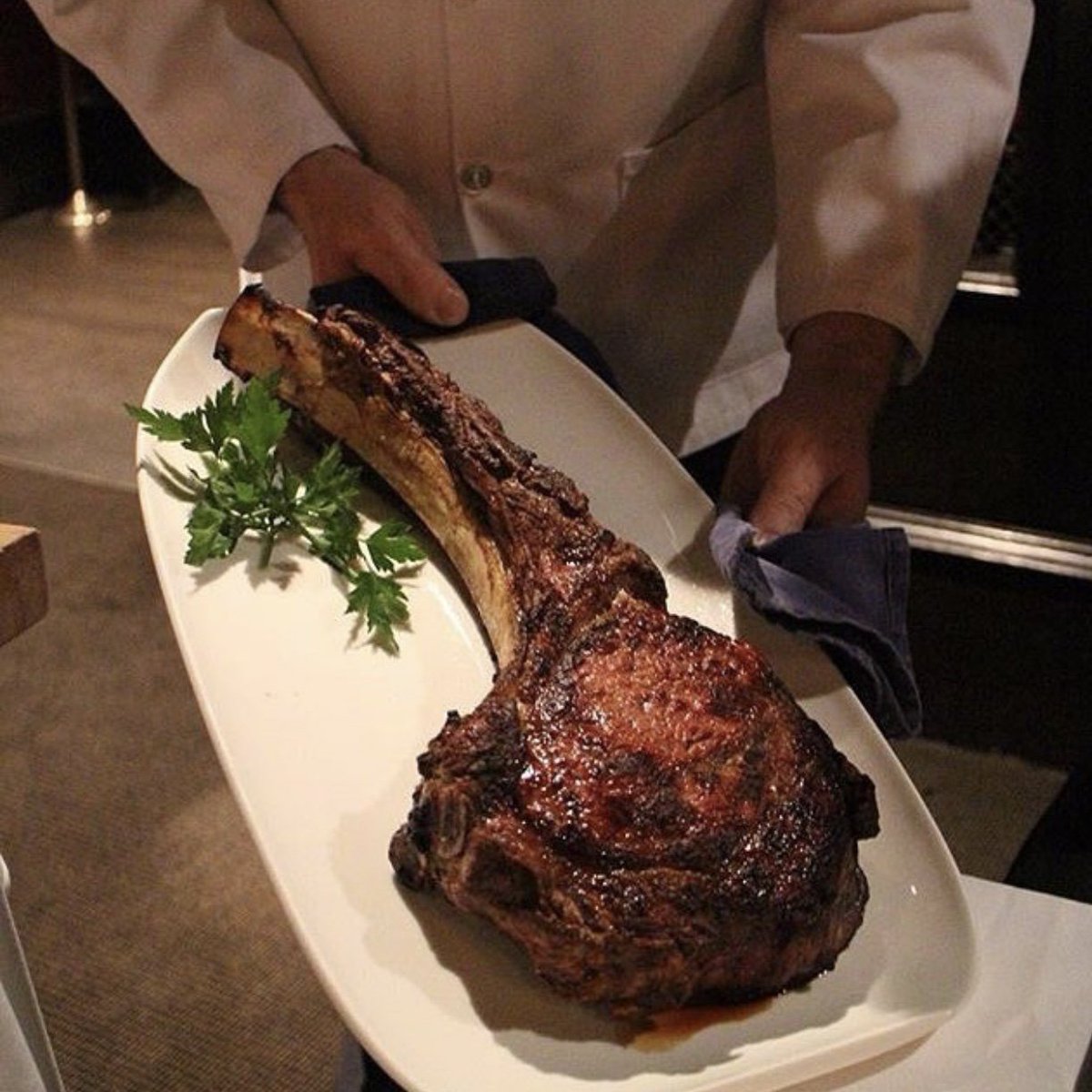Meat the butcher...behind this intimidating Tomahawk steak! <a href="/GothamVancouver/">Gotham Steakhouse</a> is back to cater our 2018 Gala. We'll tone it down for all the dressed up ladies and gents but do come hungry. Thank you Neil for your generosity #community #givingback #fundraising #gotham #guestpic
