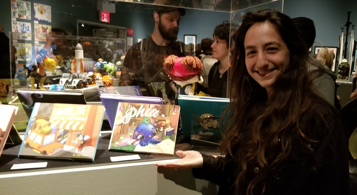 FIT_artdesign's tweet photo. Toy Design senior Jackie Kleydman beside "Phia" story about an adventurous peacock. #GraduatingExhibit18 https://t.co/7IGKZyAaMp