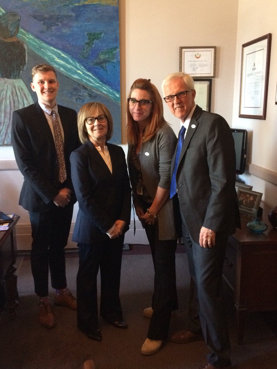 Left to right: Thomas Simpson from CNIB, Senator Judith Seidman, Laurèl Craib from the Canadian Association of Optometrists and Optimist Dr. Michael Dennis pose for a photo.