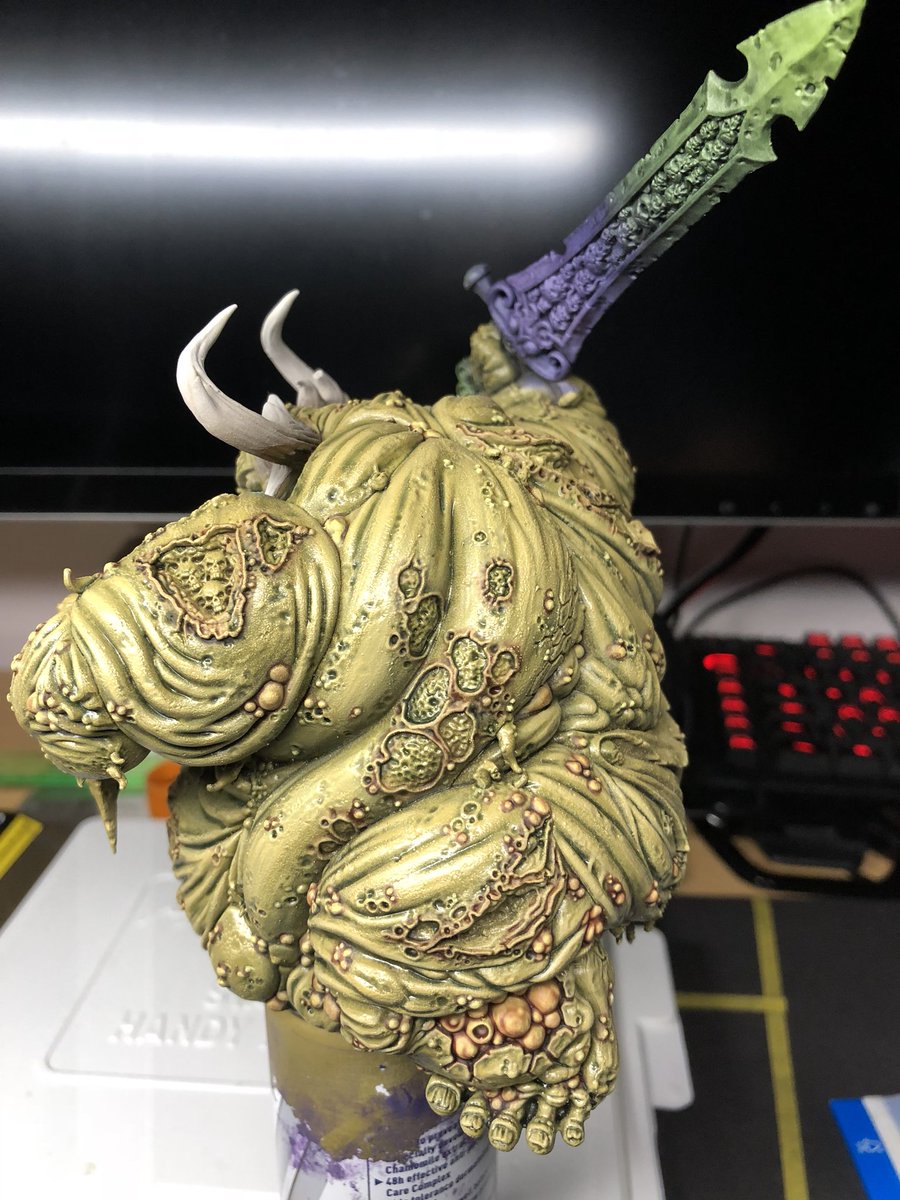 ColourOfWarUK's tweet photo. GUC WIP. Working up the boils and sores, will glaze them up to pop next. Still undecided on the sword. Not masses left to do before on to detail work and making those edges pop. follow me at https://t.co/aqiMGsIFTR #paintingwarhammer #warhammer #warhammer40k #chaos #nurgle https://t.co/VoRG9ru87b