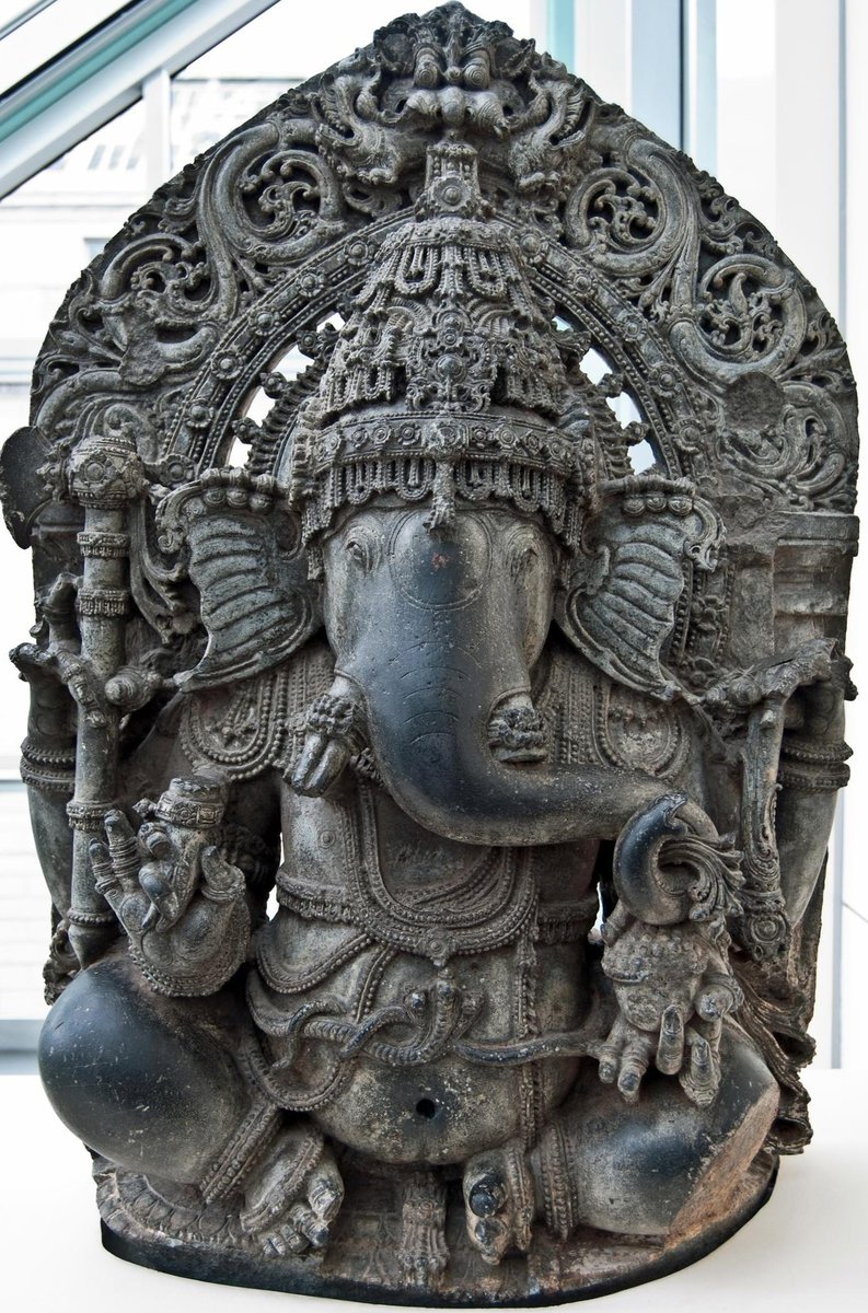 This Hoysala era Ganesha is now being held at the asian art museum in san francisco, california. Attempt to cross reference it with their website results in an authorization error.  http://searchcollection.asianart.org/view/objects/asimages/19386