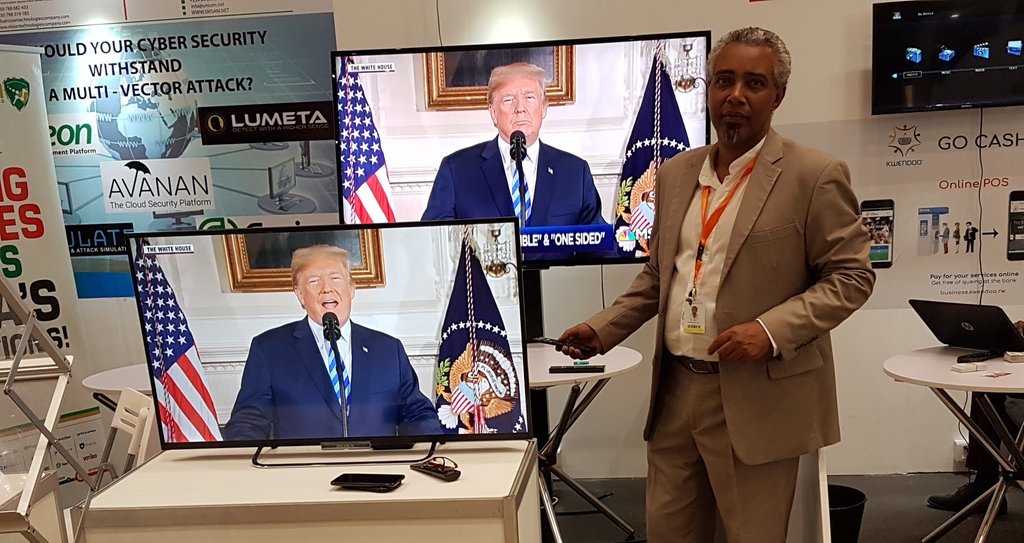 albcontact's tweet photo. At #TAS2018
#SmartAfrica... e-FABA forAfricabyAfrica 😎 ... tired of Satellite dishes ... in #Wakanda... I mean #Rwanda you can watch 100 TV &amp; movies ... just like that, check size of decoder #STBox... with the blue light in the pics ... do I sound like I'm selling carpets? 🤣😆 https://t.co/Fu6oOTDWz5