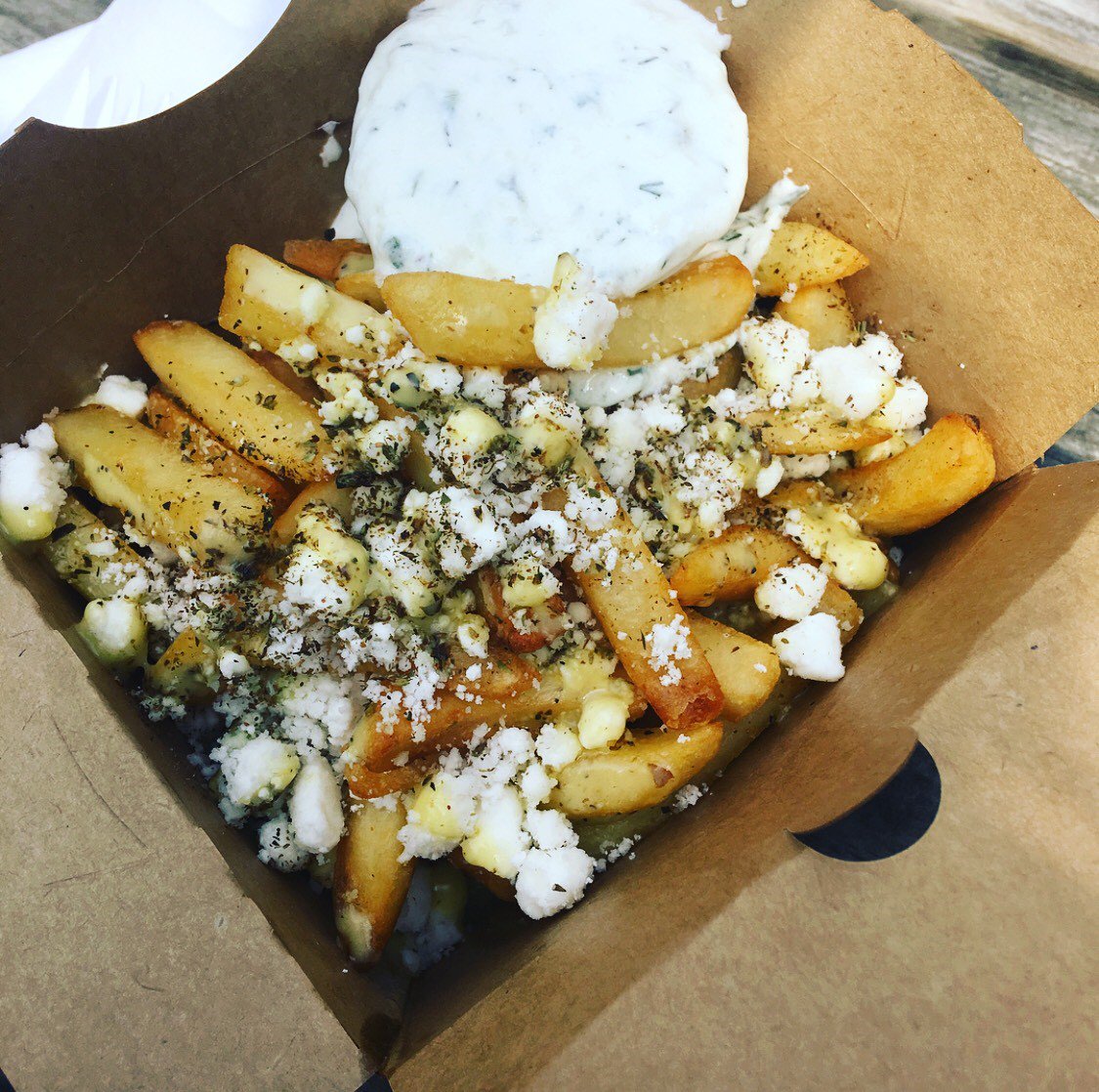 StLawrenceMkt's tweet photo. Greek fries from Yianni’s Kitchen come topped with feta, rosemary and tzatziki. 😍 All we can say is YUM. https://t.co/UAVLl6umSl