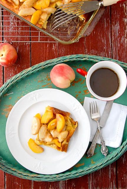 BoulderLocavore's tweet photo. Golden Oven Baked Pancake Topped with Sauteed Peaches. This taste of summer is SO easy to make for a crowd! Perfect for graduation celebrating or Mother's Day! RECIPE: https://t.co/Y0kqRy3aQH https://t.co/Hx2qpIdvet