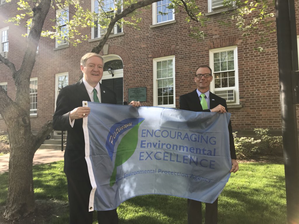 OhioEPA's tweet photo. Dir Butler presents #E3Platinum flag to @ohiou President Nellis https://t.co/sworZ1qQcw