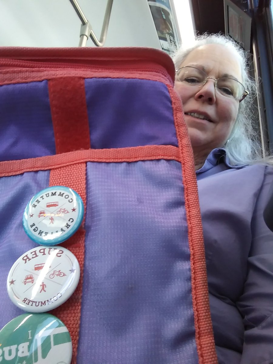 getdowntown's tweet photo. Suzanne from UM Mathematics has her buttons and a comfy seat on the bus. Let @CatchTheRide get you there. Post your pic and be entered to win prizes! #TheBusIsUs #CommuteandWin @UMPlanetBlue https://t.co/f5NCkYI5o8