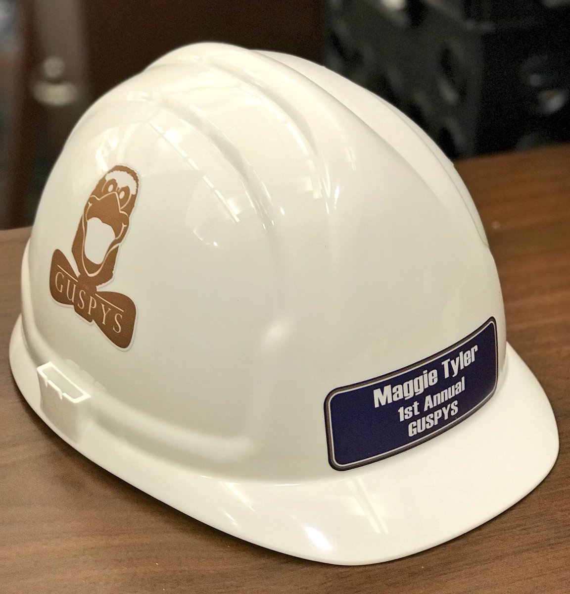 maggie_tyler11's tweet photo. I work with awesome people. Humbled to be presented with a @GSAthletics hard hat this morning :’) 

Time to do the #GUSPYS even bigger next year! 🏆 #TrueBlueCollar https://t.co/LPX2p7nnV7