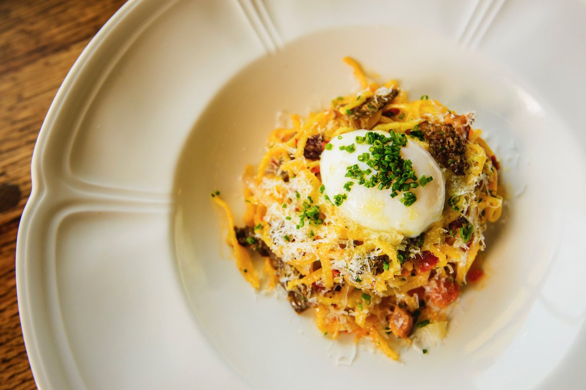 Tajarin Pasta Special- local morel mushrooms, butter braised ramps, calabrian chilis, smoked bacon, soft egg and parmesan.
#morelmushrooms 
#local 
#food 
#stirnella 
#blackstonedistrict