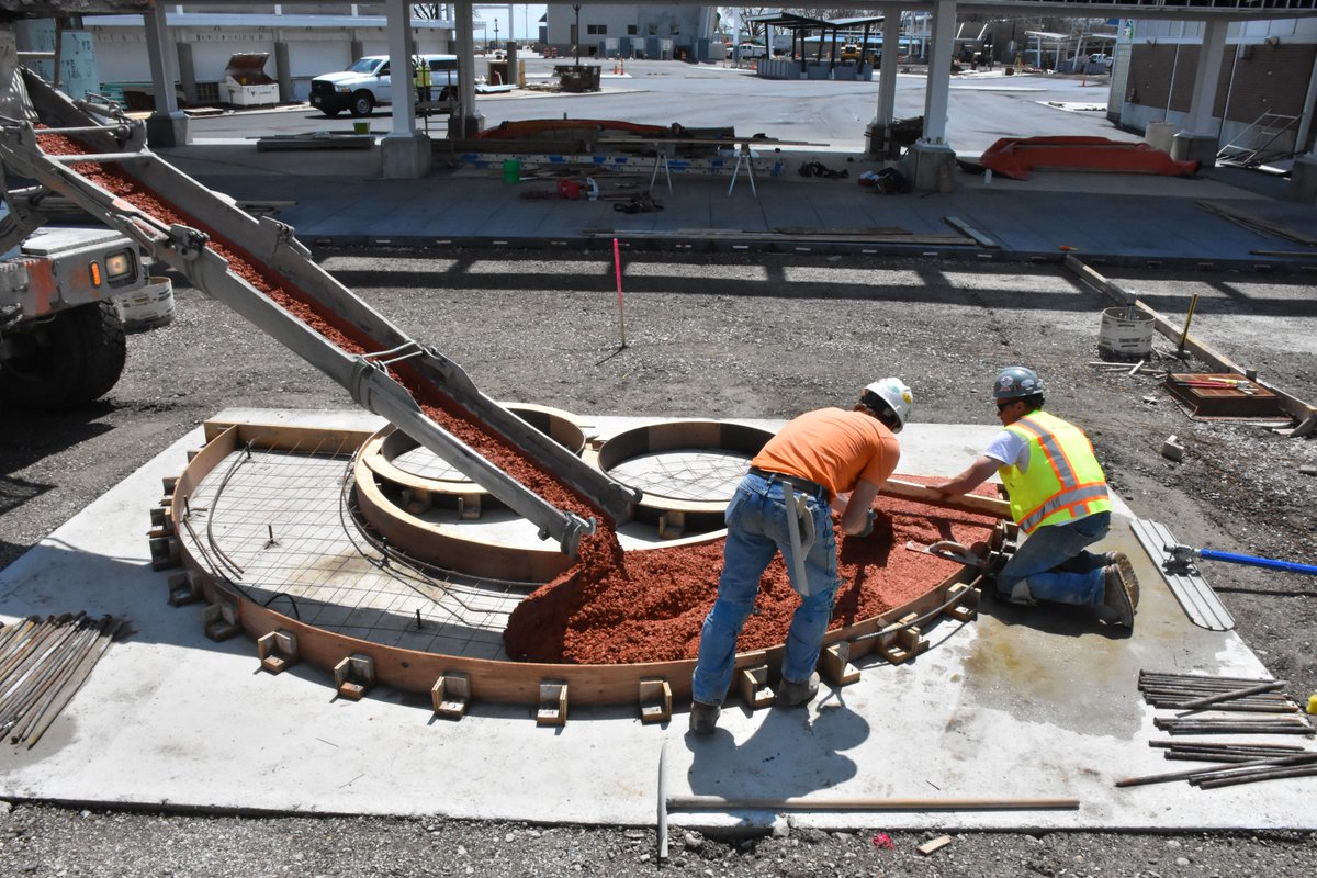 Summerfest's tweet photo. The iconic smile at the @amfam North gate has been poured with help from @EUA and @cgschmidtinc! We can't wait until you can see it in person! https://t.co/5JEjBdpTwa