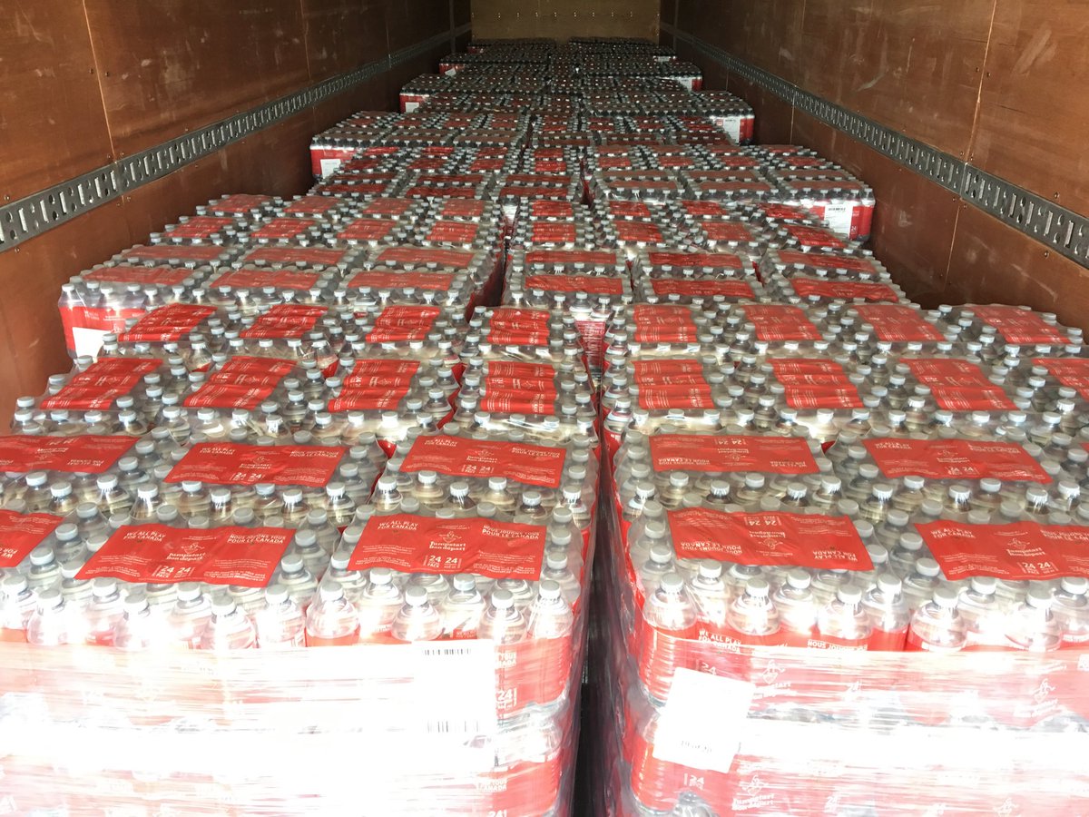 26,000 bottles of water just dropped off by #CanadianTire at #GrandBayWestfield distribution centre. @CTVAtlantic #Flood2018