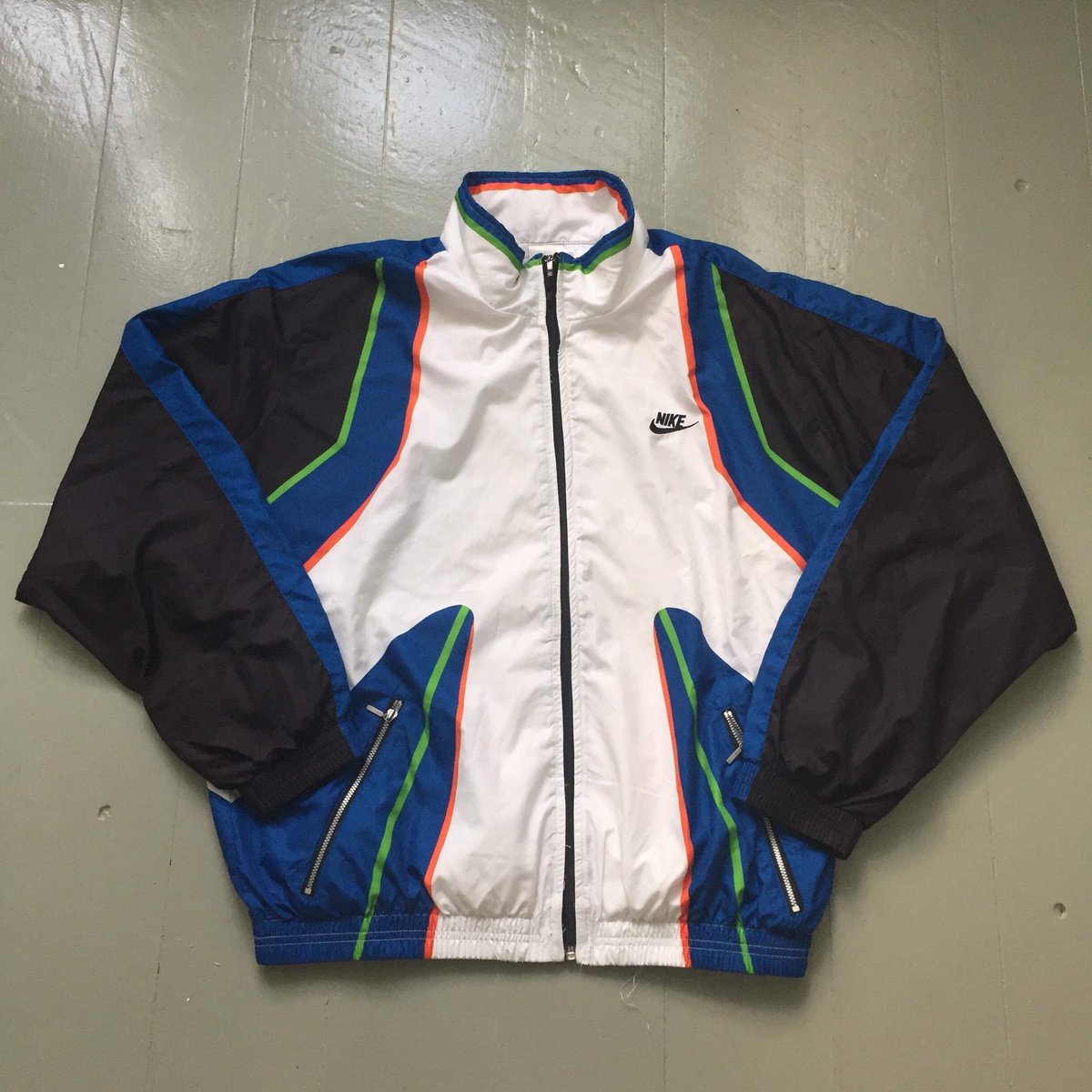 nike store track jacket sizing