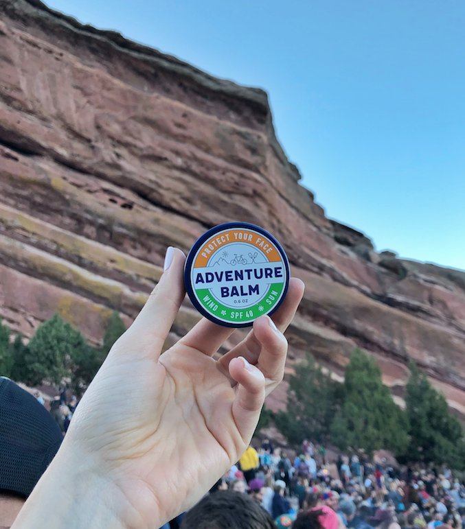 Has anyone ever been to a concert at Red Rocks Amphitheater? Our Graphic Designer, Shannon, just went there last weekend and brought Adventure Balm with her to protect from the Colorado sun. Who have you seen at Red Rocks?