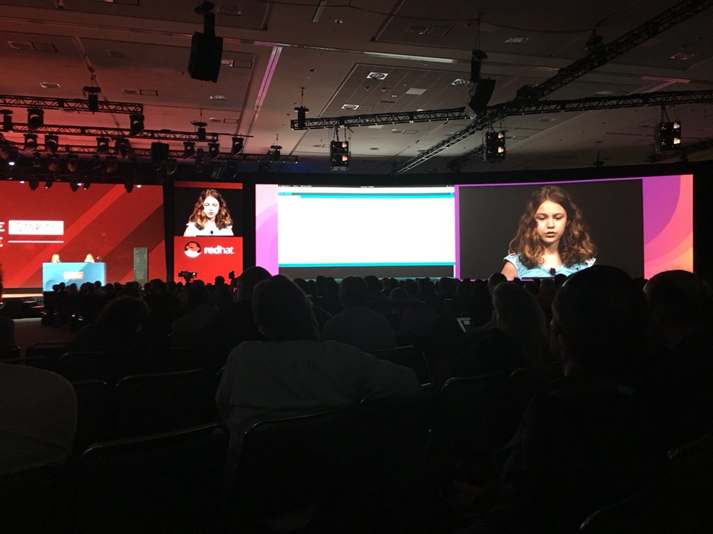 JJMara's tweet photo. An 11 year old doing a coding demo on the main stage with @Jewelbots. 😍 #RHsummit https://t.co/TbysKxb738