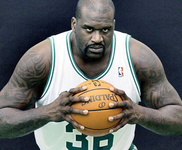 Shaq Holding Things