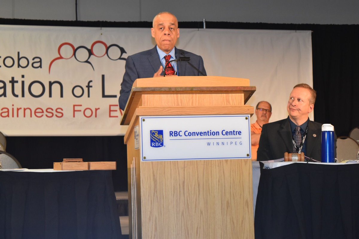MGEUnion's tweet photo. Larry Rousseau of the Canadian Labour Congress (CLC) is addressing delegates of #MFL2018. After a review of the federal labour climate, he made an impassioned plea for a national Pharmacare program. https://t.co/F6QoHxz1mj