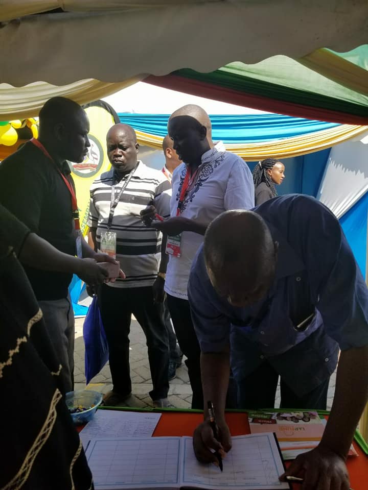 Migori Governor Okoth Obado and Busia Governor Sospeter Ojaamong signing our visitors book during a visit to our stand at the Legislative Summit in Mombasa. #LegislativeSummit