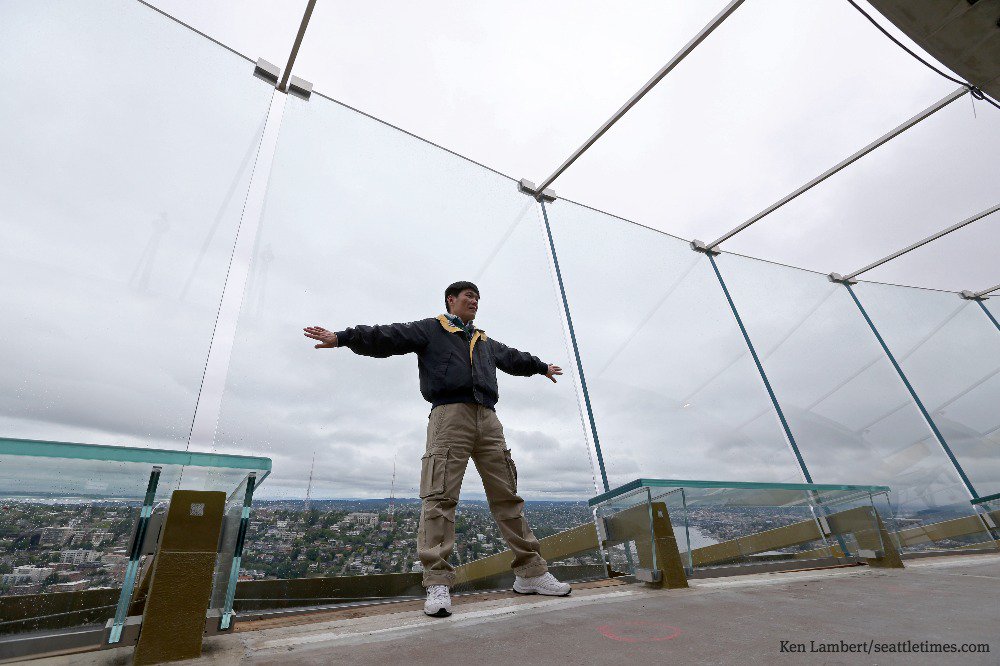 Whoa! check out the new and improved space needle. all new glass walls