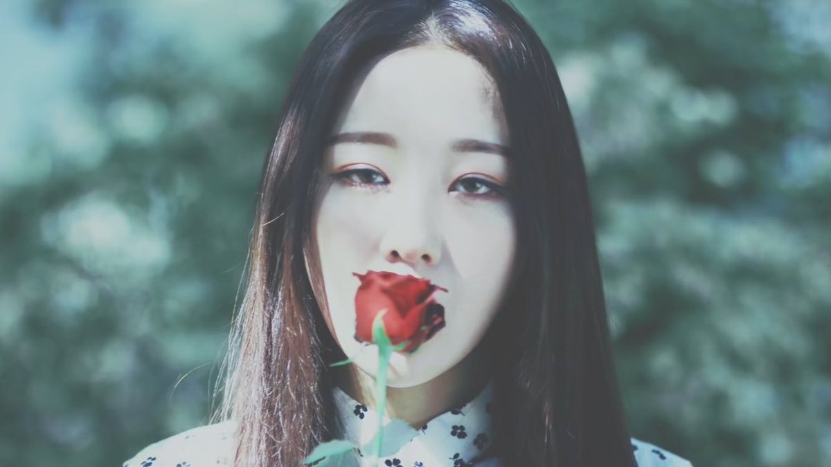 yvesdoingthings's tweet image. yves kissing gowon through a rose (2018)