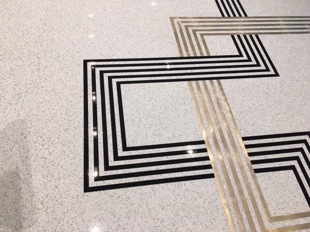TerrazzoMarble's tweet photo. #epoxyterrazzo with brass and black inset divider strips have us feeling some type of way! 🙌

#terrazzothursday featuring the Embassy Suites! 
#terrazzocontractor: North American Terrazzo, Inc.
.
.
#terrazzo #terroxy #epoxy #epoxyresin #flooring #floordesign #dividerstrips https://t.co/BBEt13vKC2