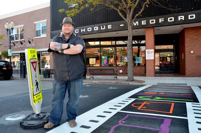smart_crosswalk's tweet photo. #TBT '15 - ArtSpace artist Dave Rogers stands in the middle of his #design for Patchogue's LightGuard Systems #lighted #crosswalk, the first on Long Island https://t.co/KeFszyxJsm @davesartstudio @LIAdvance #urban #pedestrian #safety #public #LED #IRWL #mural #NY #art https://t.co/EXdP5KWbCX