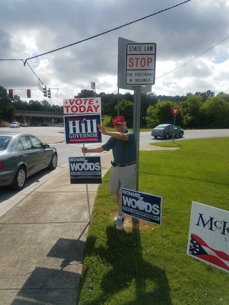 votehunterhill's tweet photo. Conrad is waving signs in Cherokee! #TeamHill has some incredible supporters! #gapol https://t.co/TnDuNZzcgg