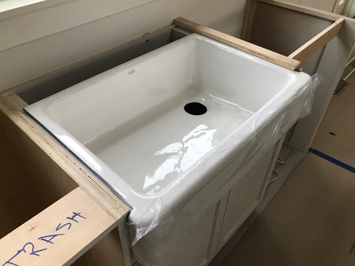 DixVen's tweet photo. The “start” of a Cast Iron Farm Sink being installed underneath the granite countertops. A professional job! https://t.co/d3j1bzuOME