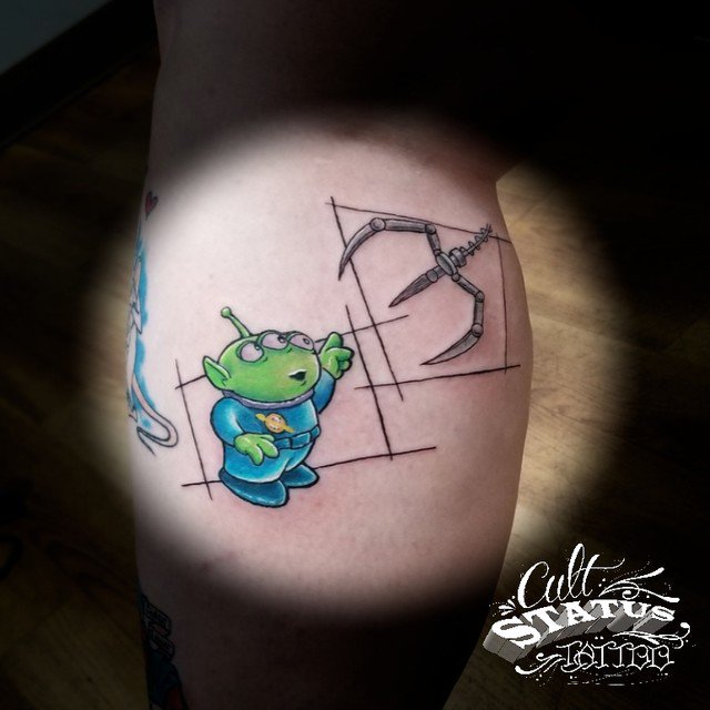 Toy Story Alien tattoo.