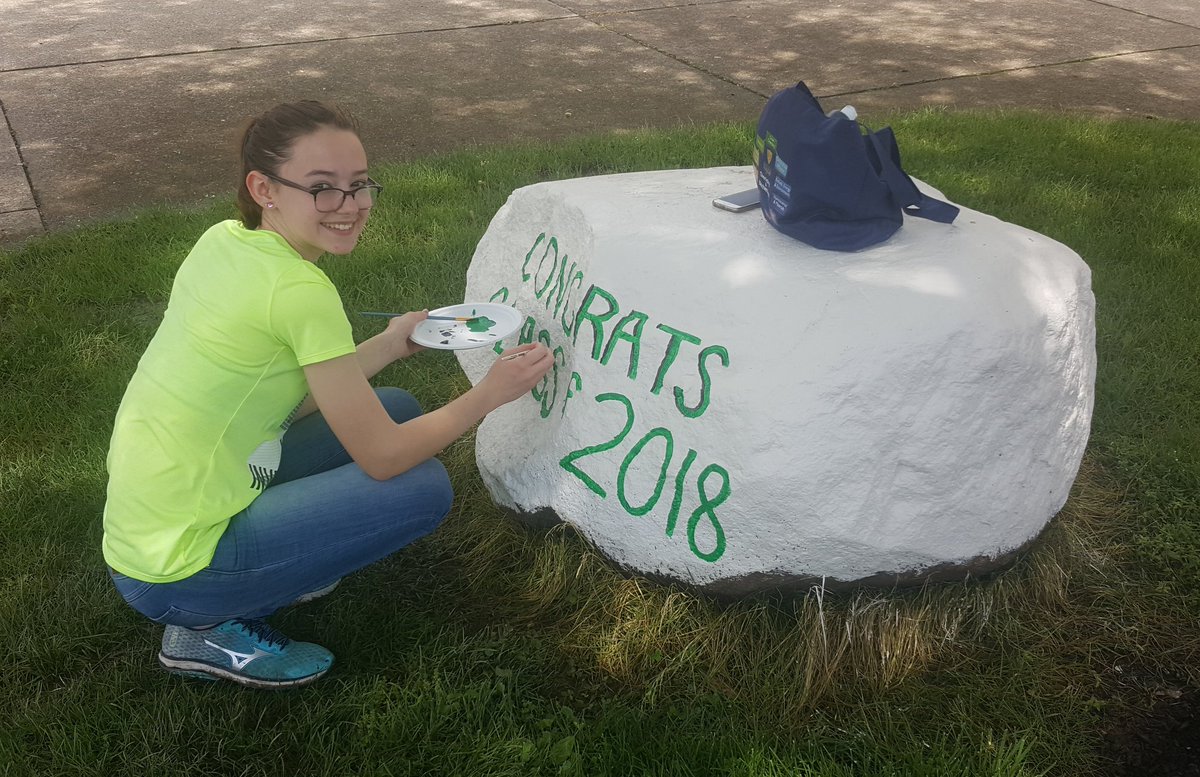 Beth Ziegelmeyer '18 is putting the finishing touches on the Panther rock. Thank you Beth for sharing your amazing talent with EC these past four years. You have left artistic touches throughout the school. May you continue sharing that talent. #ECinspiredstudents