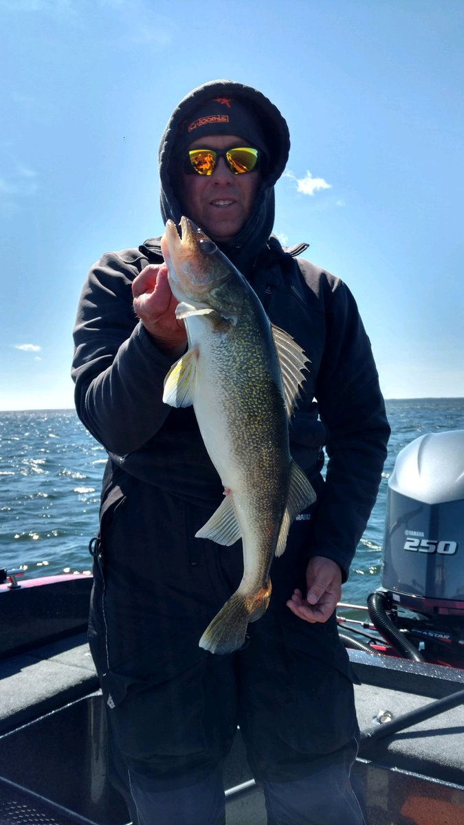 KKellyWalleyes's tweet photo. Battled the wind and cold for #walleye #fishing on #bigwinnie Saturday with @rasicnad. What happened to 80 degree weather? Had to pull the #frabill i5 back out! We and the #walleye welcomed the afternoon sun! https://t.co/SSy2Ult3xK