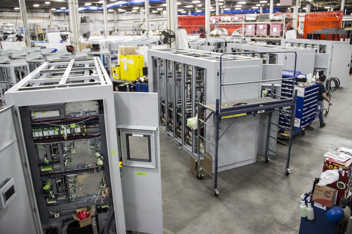 DynapowerEnergy's tweet photo. #energystorage inverters for as far as the eye can see! #40MWs @pjminterconnect @pjminterconnect https://t.co/gx2rE9jRsw