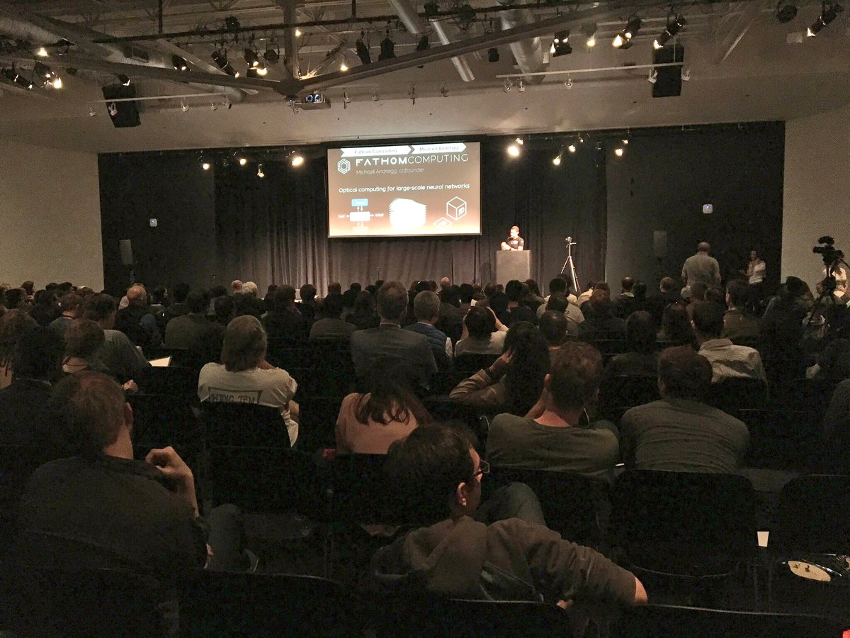 TangAnnabelle's tweet photo. #TBT #2018aidownload Michael Andregg, co-founder at Fathom Computing, talked about using brain-scale optical processors to train neural networks. https://t.co/yOOzi9Q58k