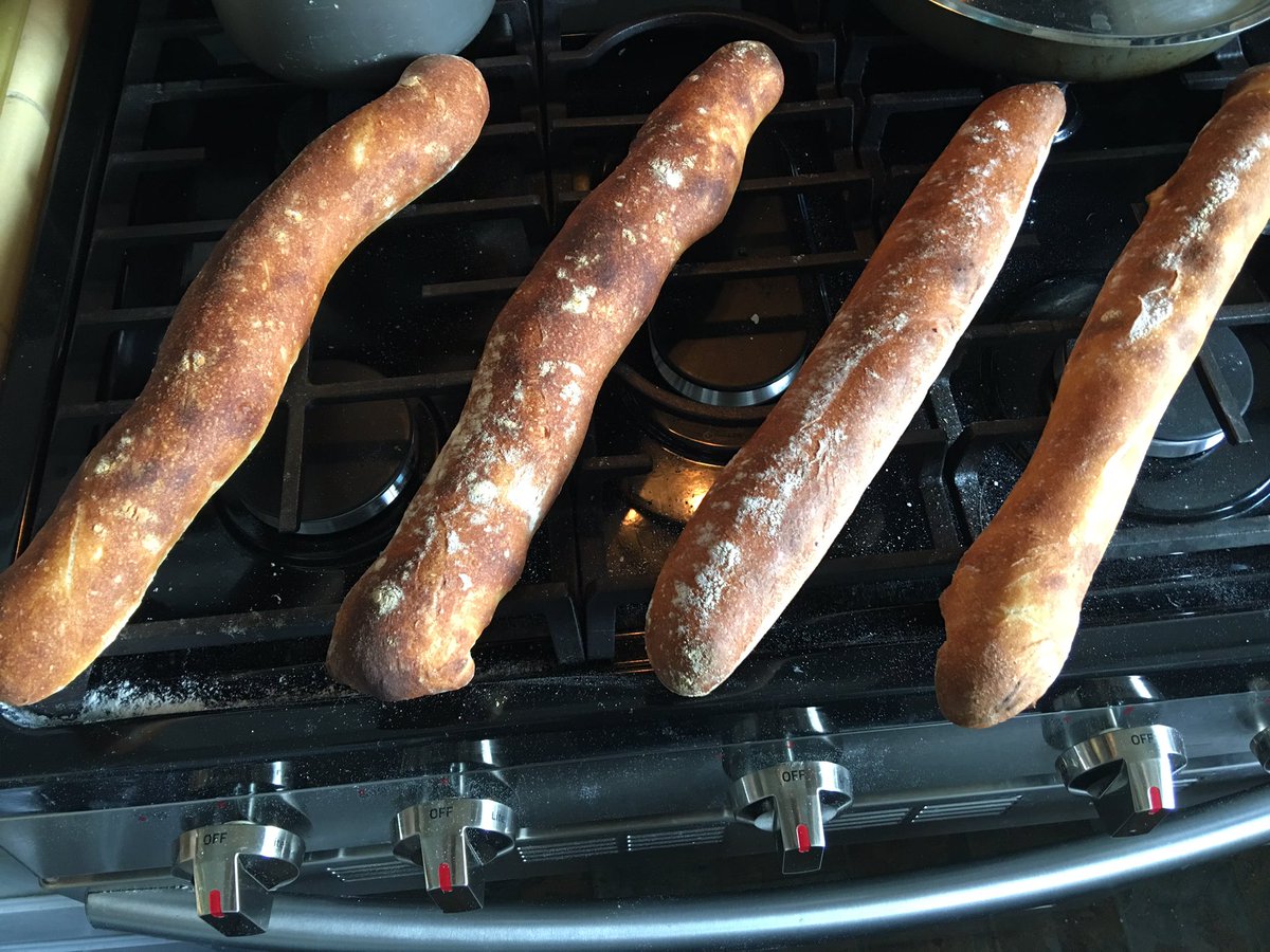 Fusionz10's tweet photo. Made some fresh bread but it got a bit wonky during transfer to oven https://t.co/SK5s6Udyl1