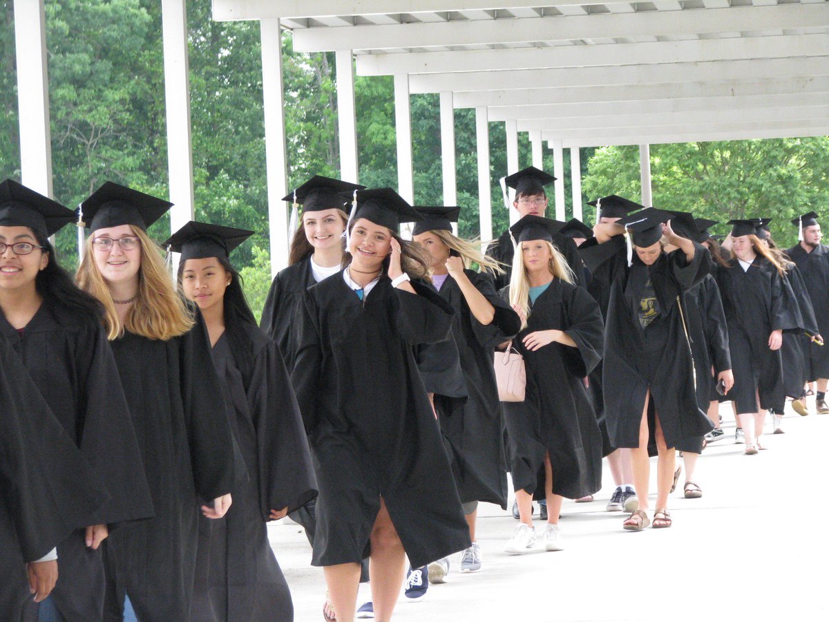 FriendshipElem's tweet photo. @dcsnc FES Cougar Pride! We were thrilled for former students (now seniors in Class of 2018) dressed in cap and gown walk our halls as students congratulated them! https://t.co/L4gxebZFoz