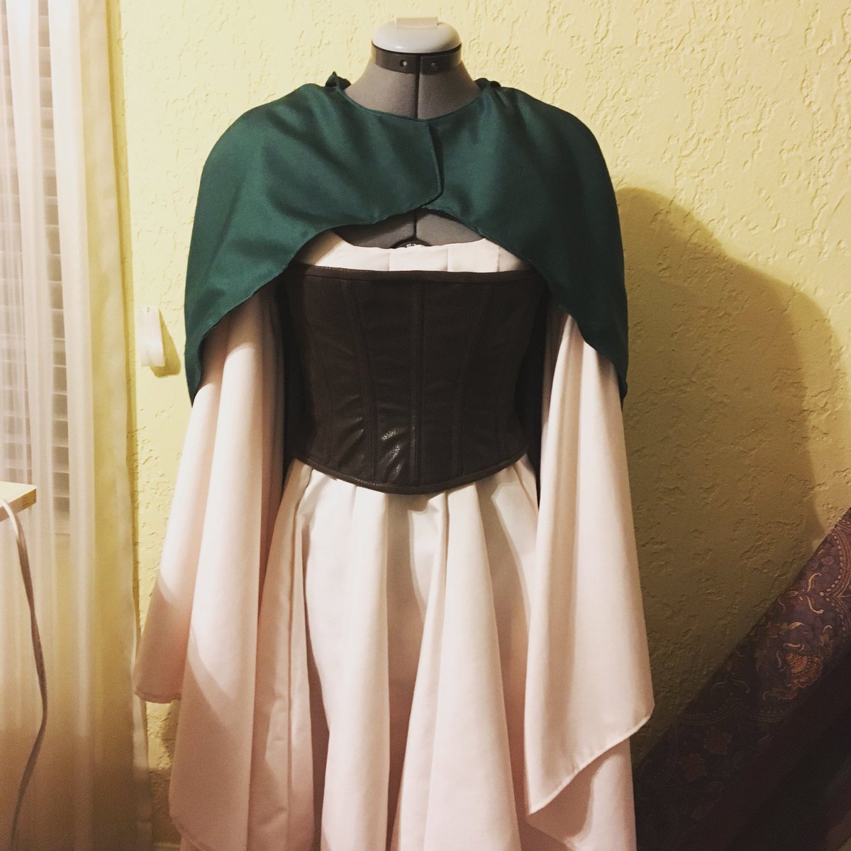 MissElizaCreate's tweet photo. Regular!Jester just needs a cloak pin and then she will be finished. Very excited for her test run the final weekend of OKRF. #criticalrolecosplay #criticalrole #jestercosplay #sewing #cosplay #okrf https://t.co/RMDkMdcX1X