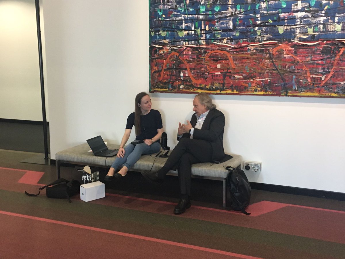 Juxi's tweet image. I spy with my little eye ... @NicoleRobinsone and @rodneyabrooks chatting away @ieee_ras_icra #ICRA2018, can't wait for that episode of @TheAIRCode #robotics and #AI podcast