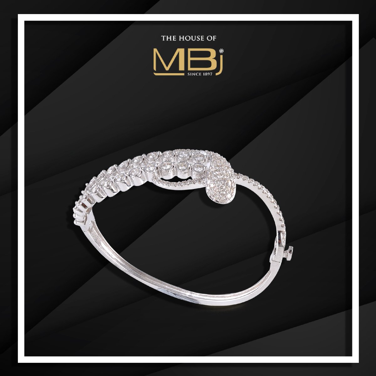 Be a vision with this statemental diamond bracelet; be the next talk of the town.
#TheHouseofMBj #MBjIndia #Diamondjewellery #Diamondbraclet #Indianjewellery