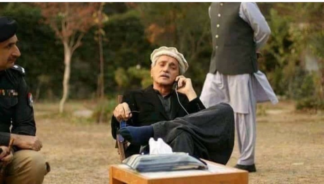 PYO_KP's tweet photo. A disqualified Punjabi MNA sitting like a king infront of a DIG of supposedly independent and Autonomous #KPK #Police in Swat. They say that Sindh Police is politicised. Can anyone treat Police Officers like this in Sindh? No https://t.co/6sXFYyXKaF