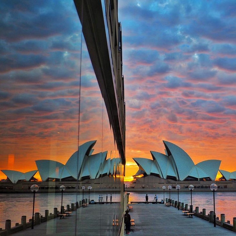 Australia's tweet photo. What's more impressive than the @sydoperahouse at sunrise? Two of them, of course! 😉 (via IG/watersurfr) #seeaustralia https://t.co/kTjelLA2rH