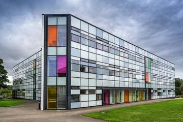 An Open University building with colourful glass panels