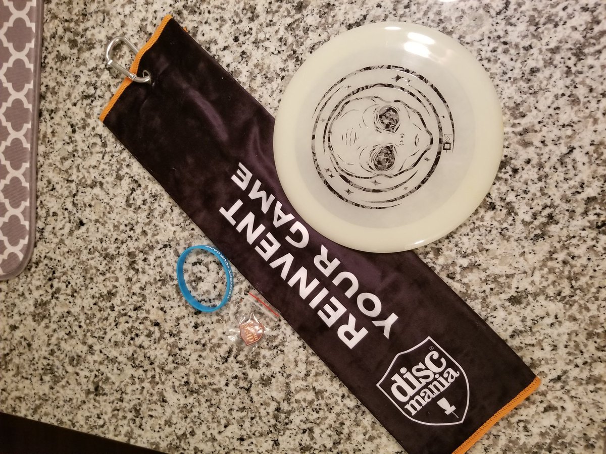 daves_beets's tweet photo. Excited about this months @discmaniadiscs #discmember package from @discstore. The stamp matches the countertop! That glow tho https://t.co/RlUKI7UWKG