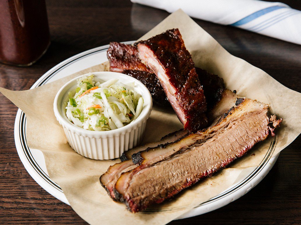 Have you tried our Two 'Que Plate? Choose a combination of two meats and one side - delicious and fulfilling.

Reservations: bit.ly/18thandvinebbq