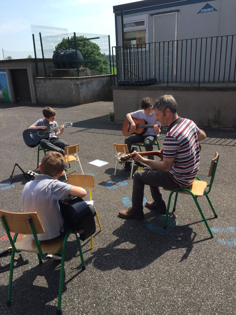 Guitar lessons in the sun today!