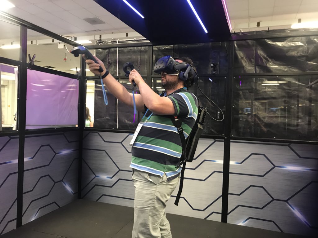 AiSolve's tweet photo. Defeating the space creatures like a pro at #VRWorld2018. #WePlayVR #AlienInvasion https://t.co/zjxloPEWsQ